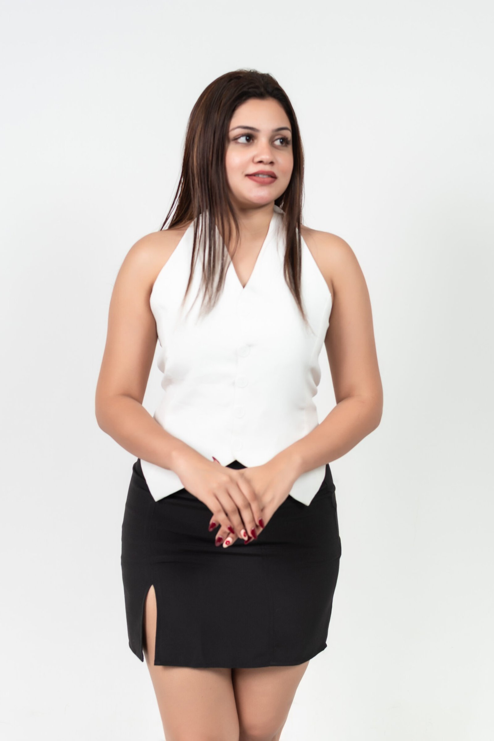 Ivory Boss Vest Set ( White tailored halter vest with black skirt chic )